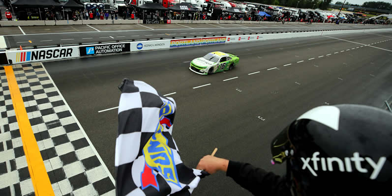 AJ Allmendinger takes the checkered flag