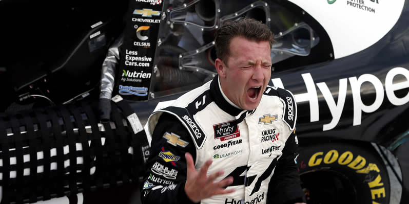 AJ Allmendinger celebrates after winning at Charlotte Motor Speedway Roval