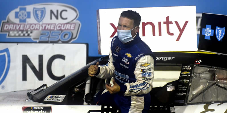 AJ Allmendinger and crew celebrate in victory lane