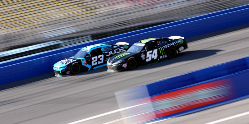 Anthony Alfredo and Ty Gibbs drive during practice