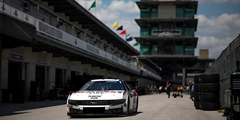 Austin Cindric exits the garage area during practice