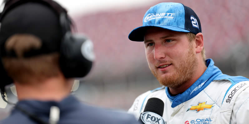 Austin Hill speaks to the media after winning the pole award