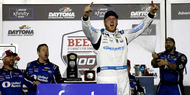 Austin Hill celebrates in victory lane