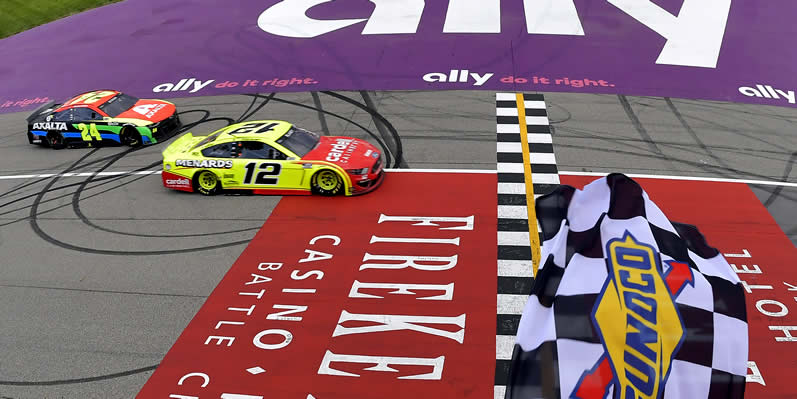 Ryan Blaney takes the checkered flag to win at Michigan International Speedway