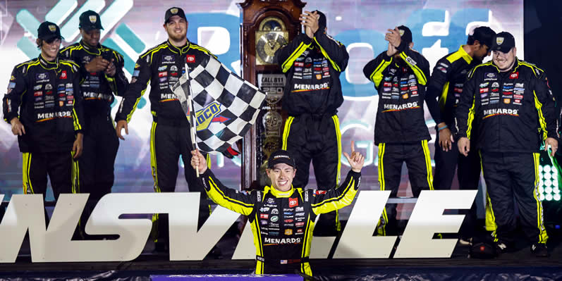 Brandon Jones celebrates in the Ruoff Mortgage victory lane