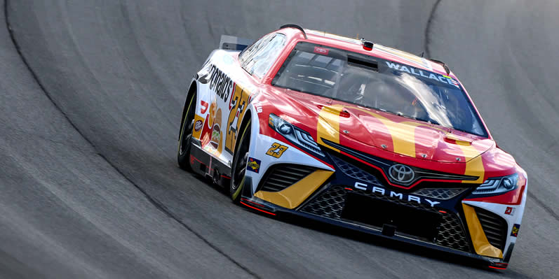 Bubba Wallace drives during practice