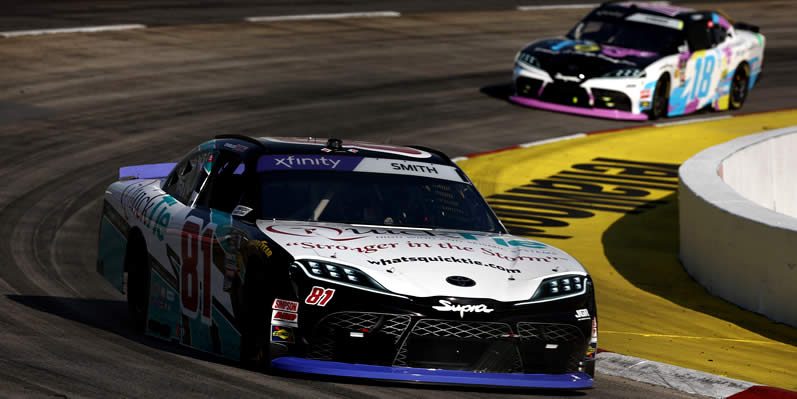 Chandler Smith and Sheldon Creed drive during practice for the NASCAR Xfinity Series National Debt Relief 250 at Martinsville Speedway on November 01, 2024 in , . (Photo by /Getty Images)