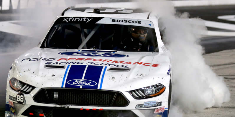 Chase Briscoe celebrates with a burnout at Bristol Motor Speedway