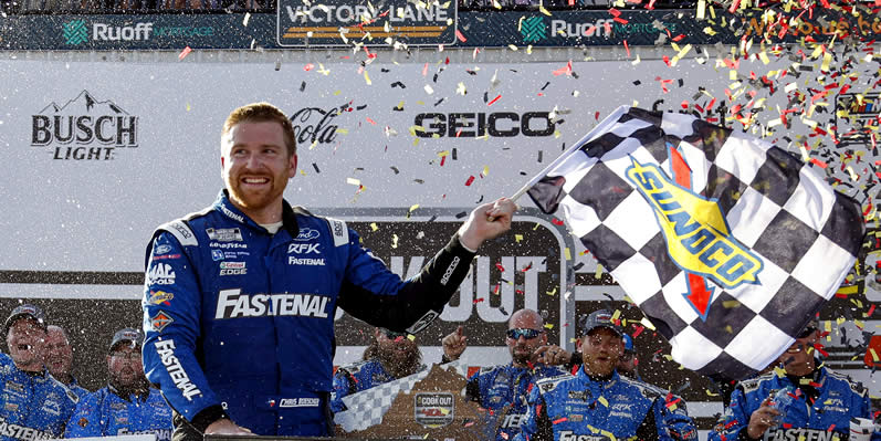 Chris Buescher celebrates with the checkered in victory lane