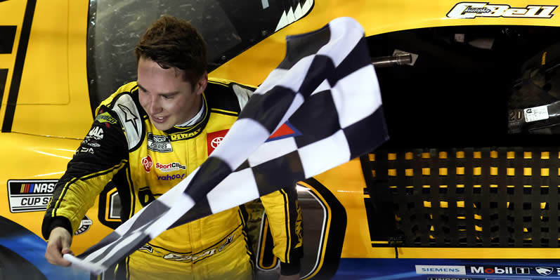 Christopher Bell celebrates with the checkered flag