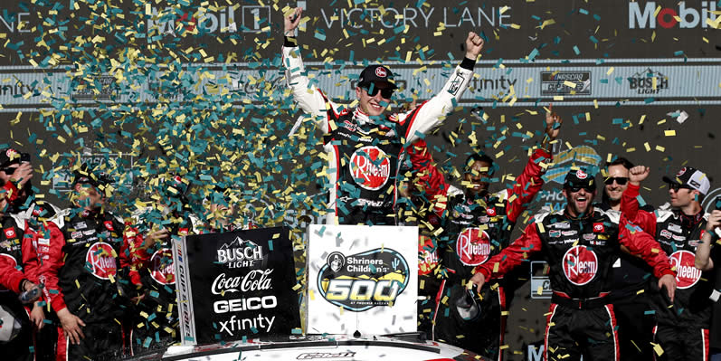 Christopher Bell celebrates in victory lane