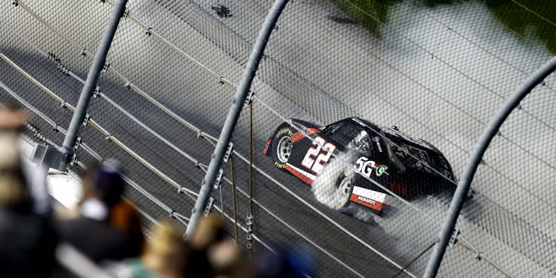 Austin Cindric celebrates with a burnout