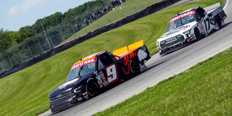 Colby Howard and Taylor Gray drive during practice