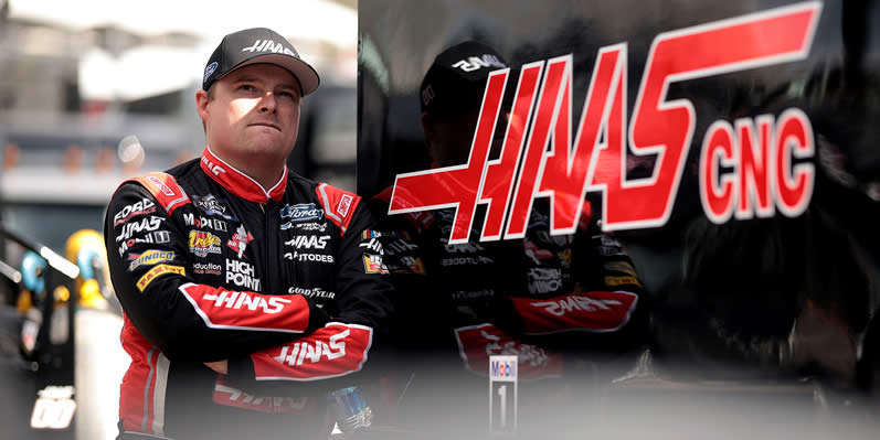 Cole Custer looks on during practice