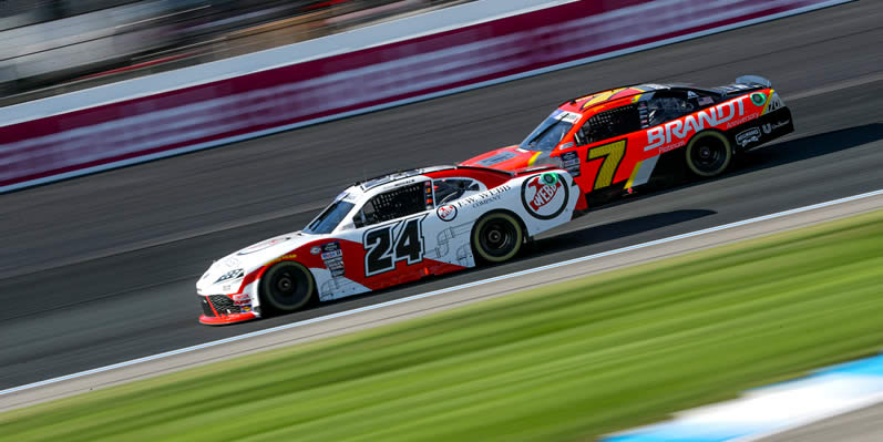 Connor Mosack and Justin Allgaier drive during qualifying