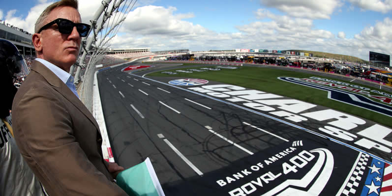 Honorary starter, actor Daniel Craig looks on from the flagstand at Charlotte Motor Speedway