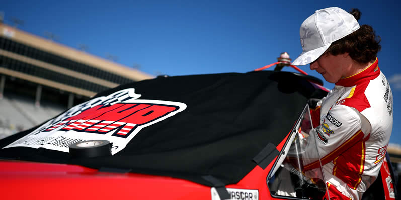 Daniel Dye enters his truck during qualifying