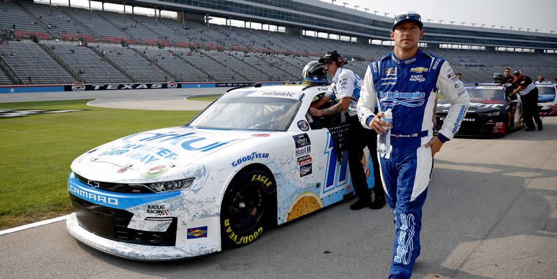 Daniel Hemric walks the grid during practice