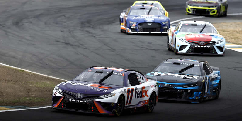 Denny Hamlin and Ross Chastain race