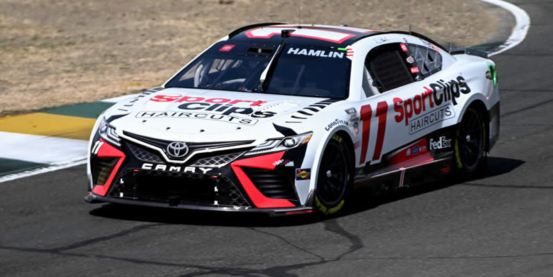 Denny Hamlin drives during qualifying