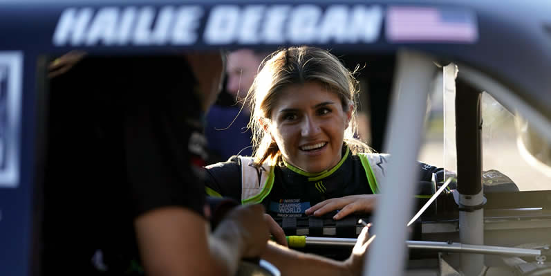 Hailie Deegan works with her crew