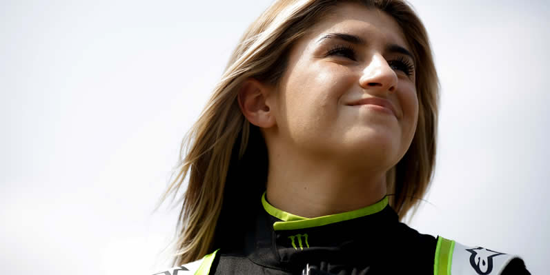 Hailie Deegan waits on the grid during qualifying