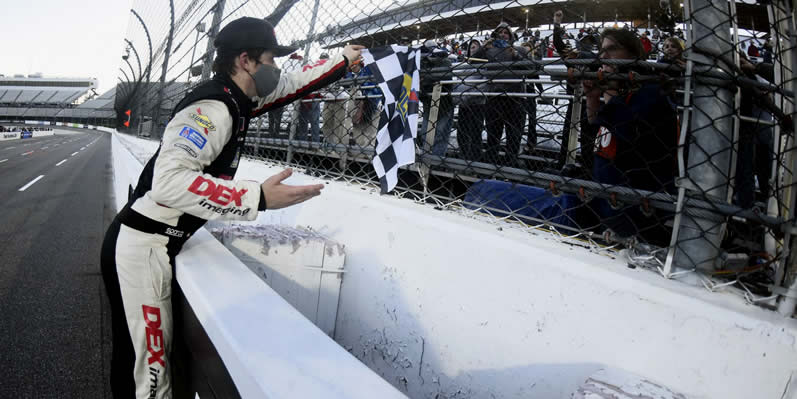 Harrison Burton celebrates with fans