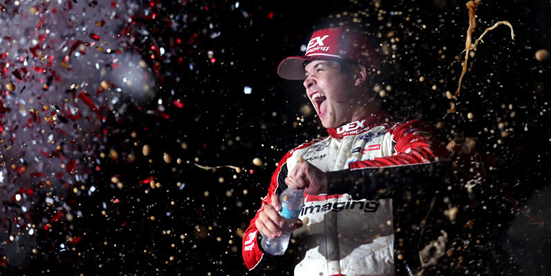 Harrison Burton celebrates in victory lane