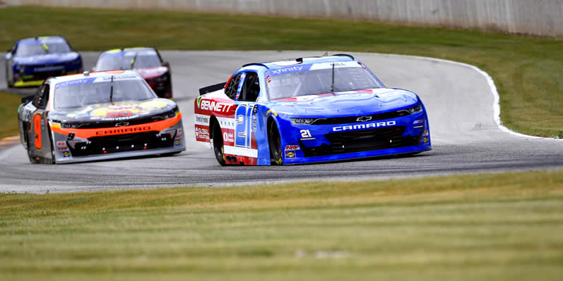 Austin Hill drives during practice