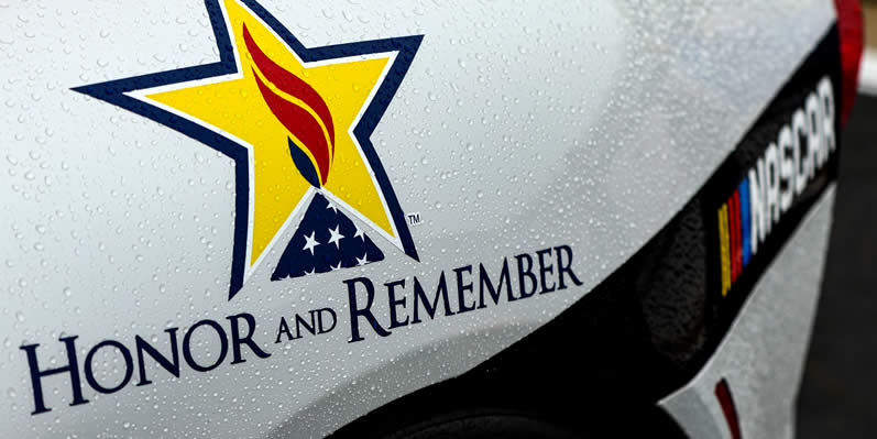 A detail view of a "HONOR AND REMEMBER" decal