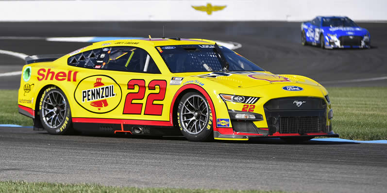 Joey Logano drives during qualifying