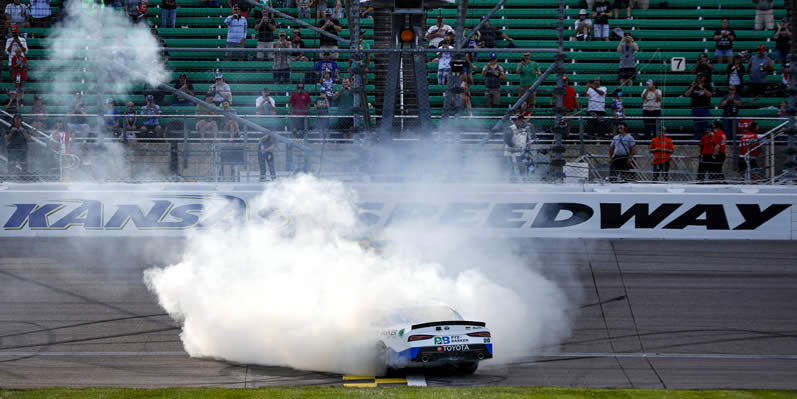 John Hunter Nemechek celebrates with a burnout after winning