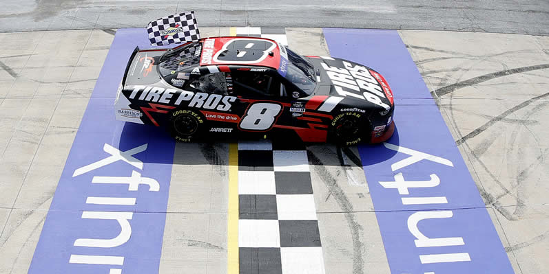 Josh Berry celebrates with the checkered flag