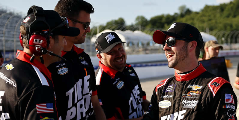 Josh Berry celebrates with his crew after winning the pole award