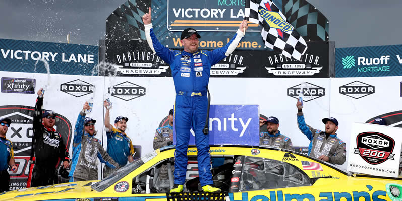 Justin Allgaier celebrates in victory lane