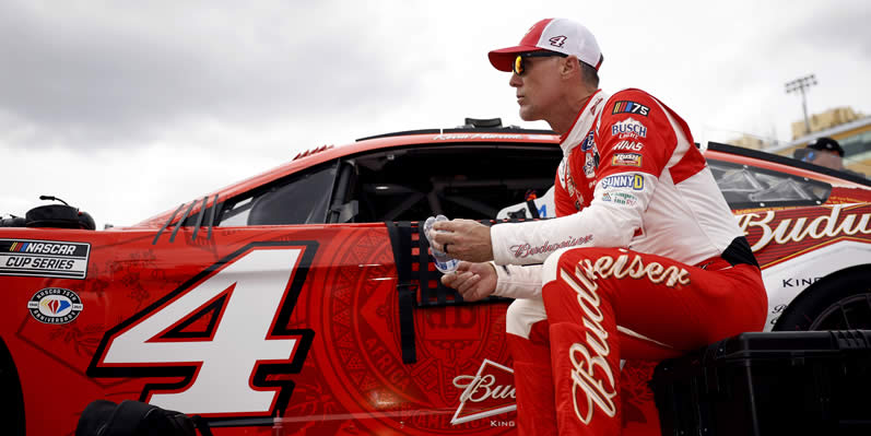 Kevin Harvick waits on the grid