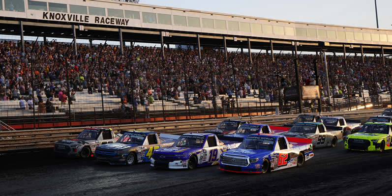 Drivers prepare for the start of the Clean Harbors 150