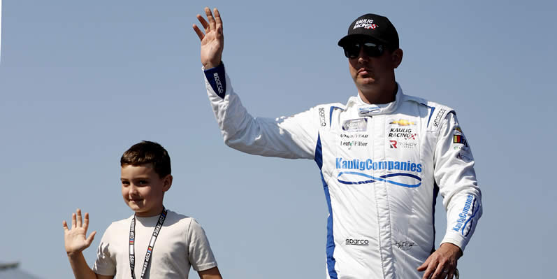 Kyle Busch and son, Brexton Busch wave to fans