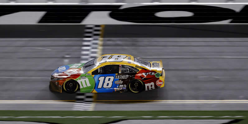 Kyle Busch crosses the finish line