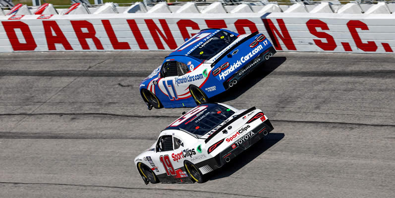 Denny Hamlin and Kyle Larson race