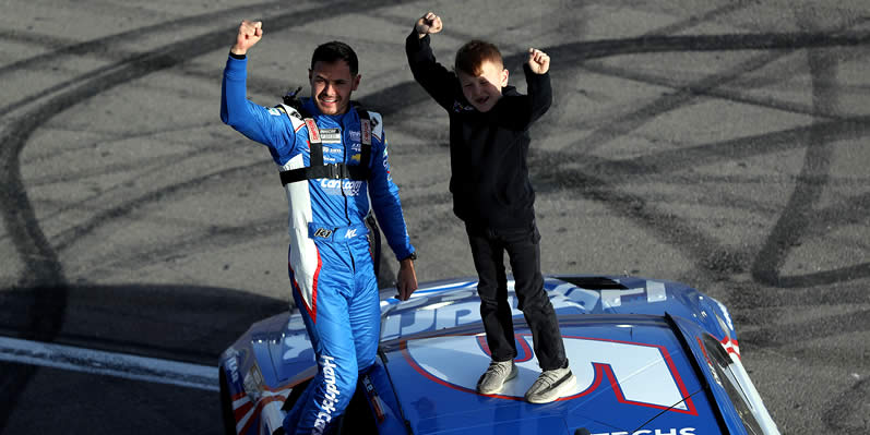 Kyle Larson celebrates with his son