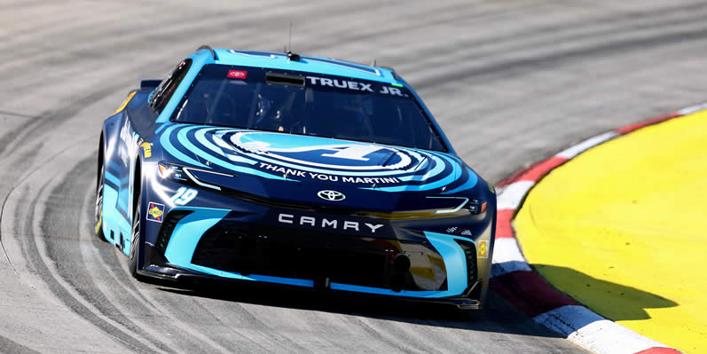 Martin Truex Jr drives during practice