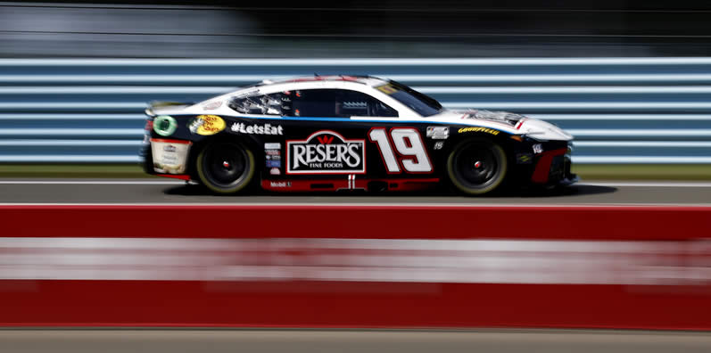 Martin Truex Jr drives during qualifying