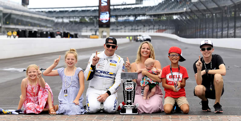 Michael McDowell and his family celebrate at the bricks