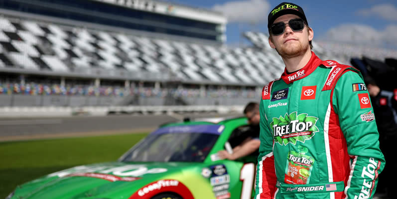 Myatt Snider walks the grid during qualifying