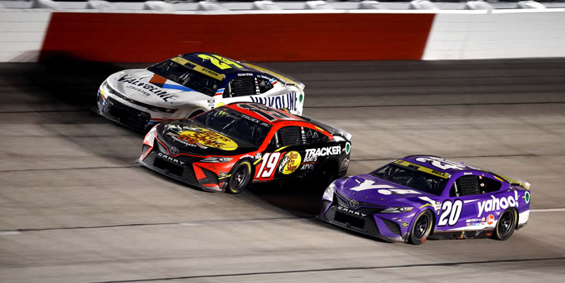 Martin Truex Jr, William Byron and Christopher Bell race