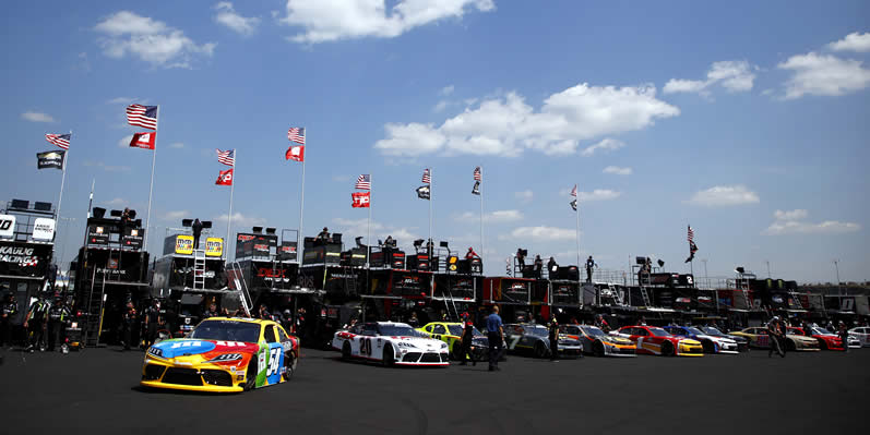 Kyle Busch exits the garage