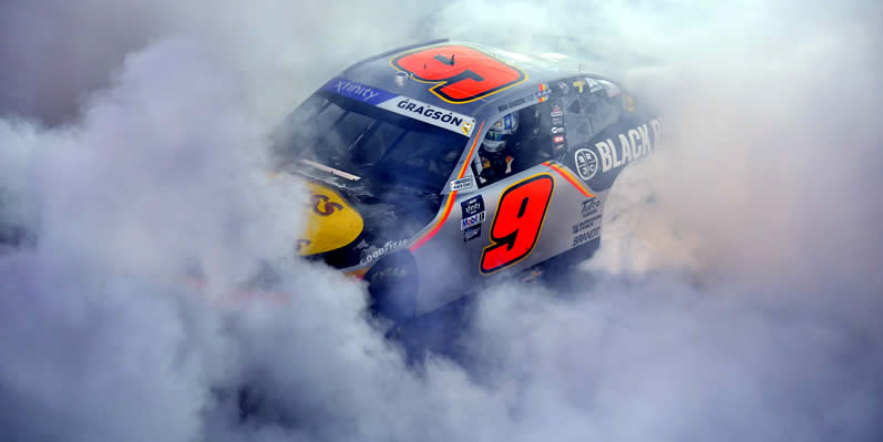 Noah Gragson celebrates with a burnout