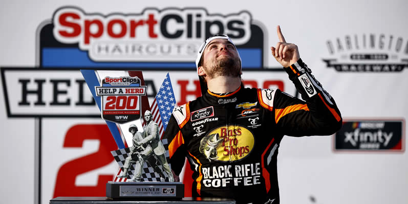 Noah Gragson celebrates in victory lane