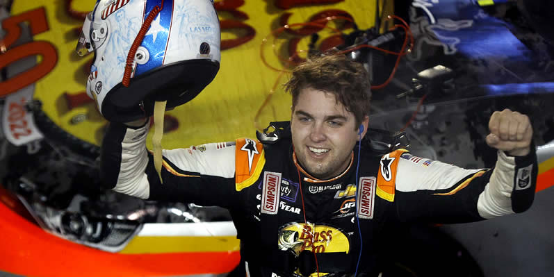 Noah Gragson celebrates after winning